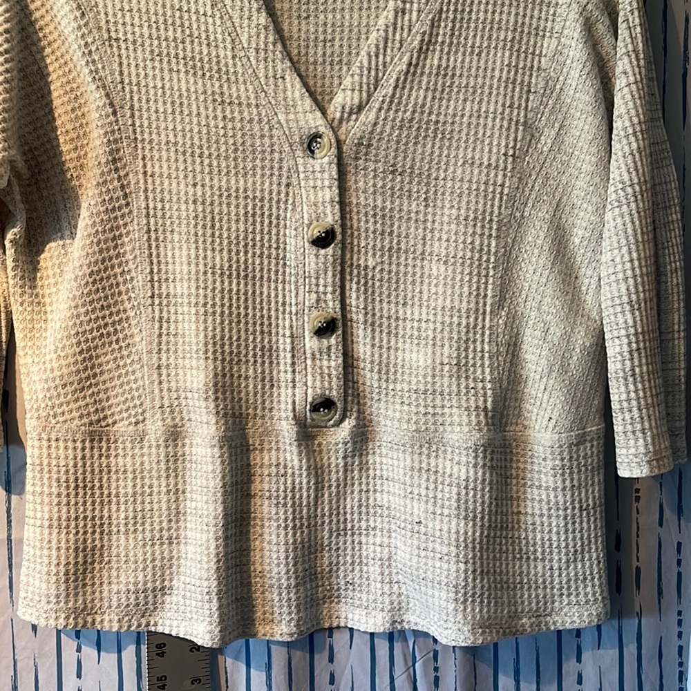 Grey/cream sweater half button down.
